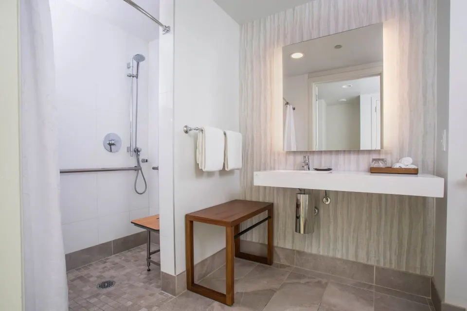 Bathroom vanity and roll-in shower area at Sheraton Maui Resort & Spa.
