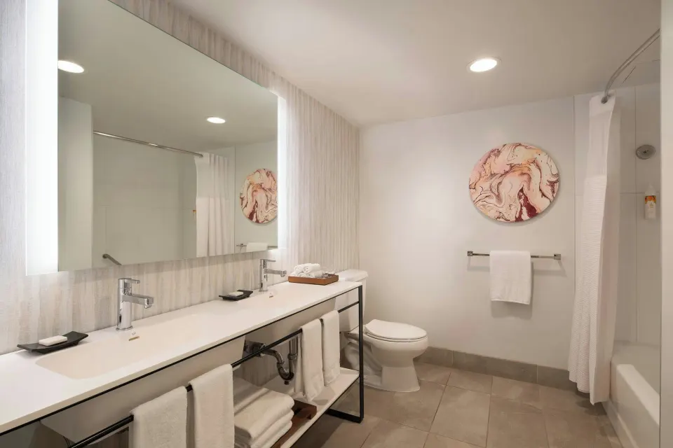 Suite bathroom with double vanity and shower at Sheraton Maui Resort & Spa.