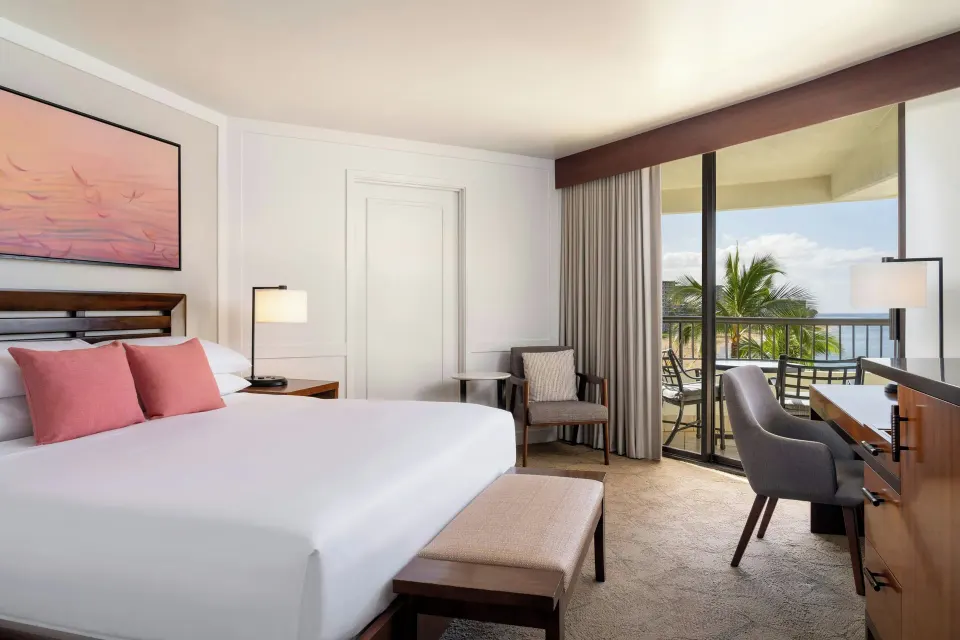 King bedroom with balcony ocean view at Sheraton Maui Resort & Spa.