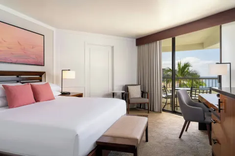 King bedroom with balcony and ocean view at Sheraton Maui Resort & Spa.