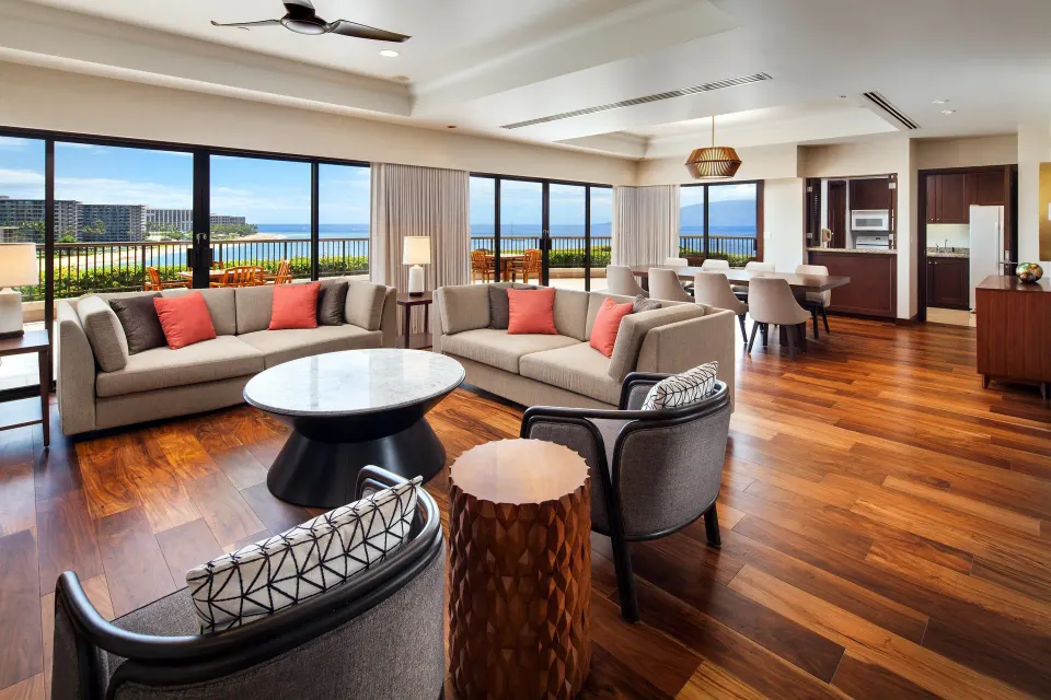 Ali'i Suite living and dining room with ocean views at Sheraton Maui Resort & Spa.