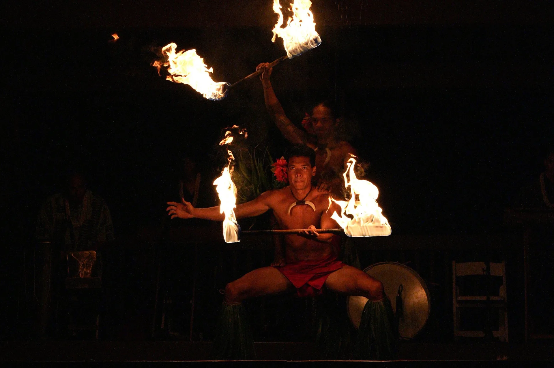 Fire dancers perform at night at Sheraton Maui Resort & Spa.