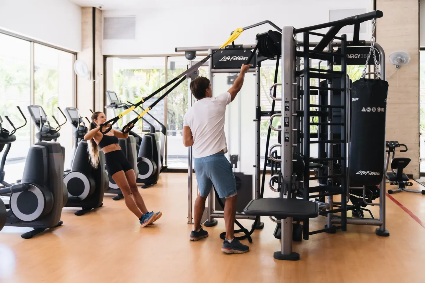 Guests use suspension straps and gym equipment at Sheraton Princess Kaiulani.