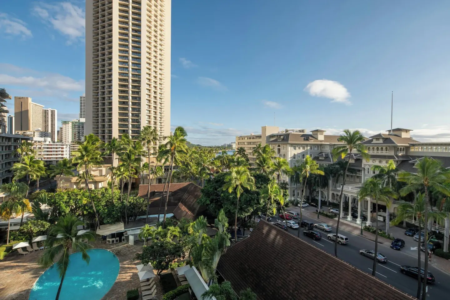 Pool view with palms and Waikiki street from Sheraton Princess Kaiulani.