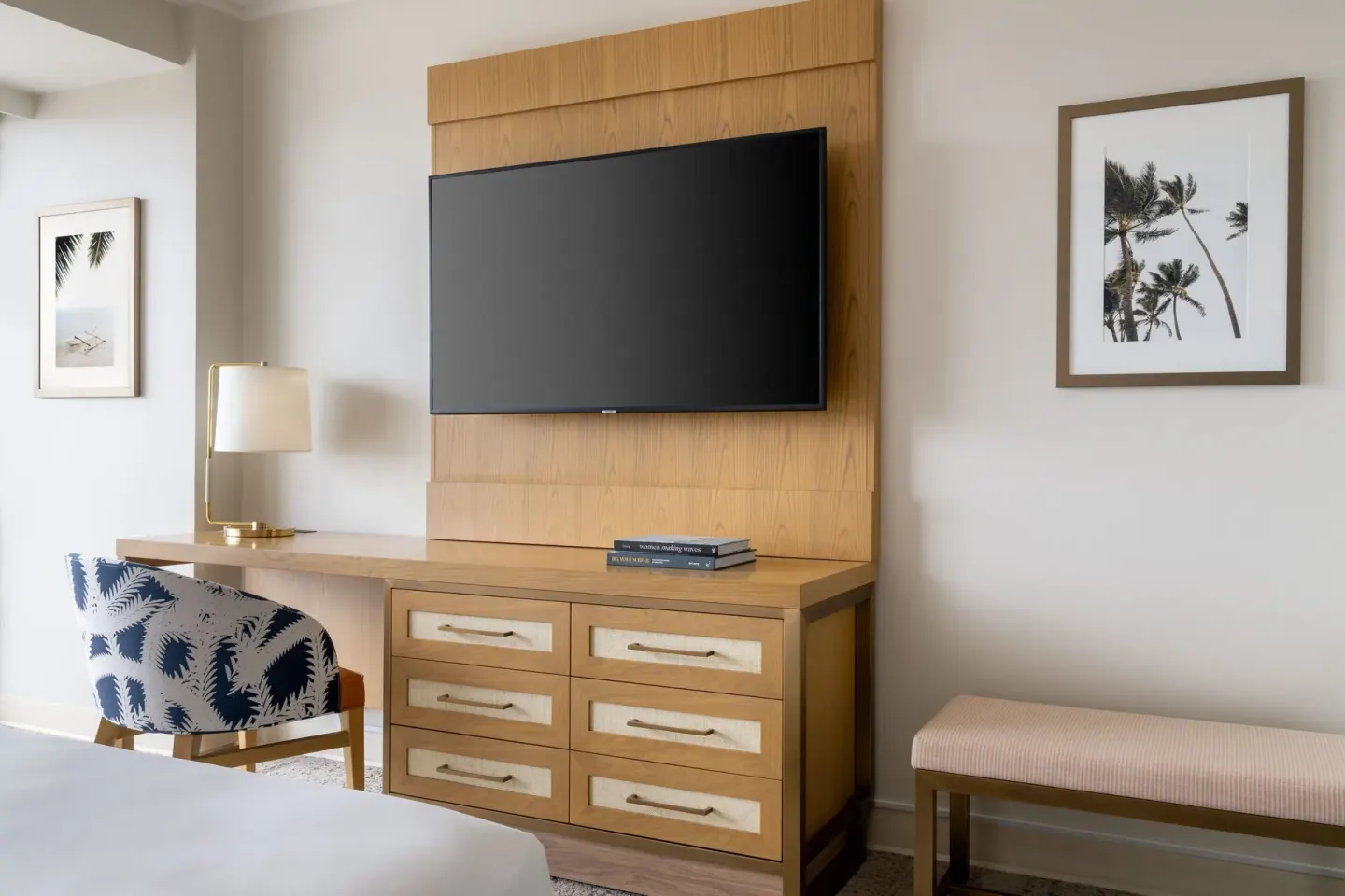 Standard Room dresser, TV, desk, and chair at Sheraton Princess Kaiulani.