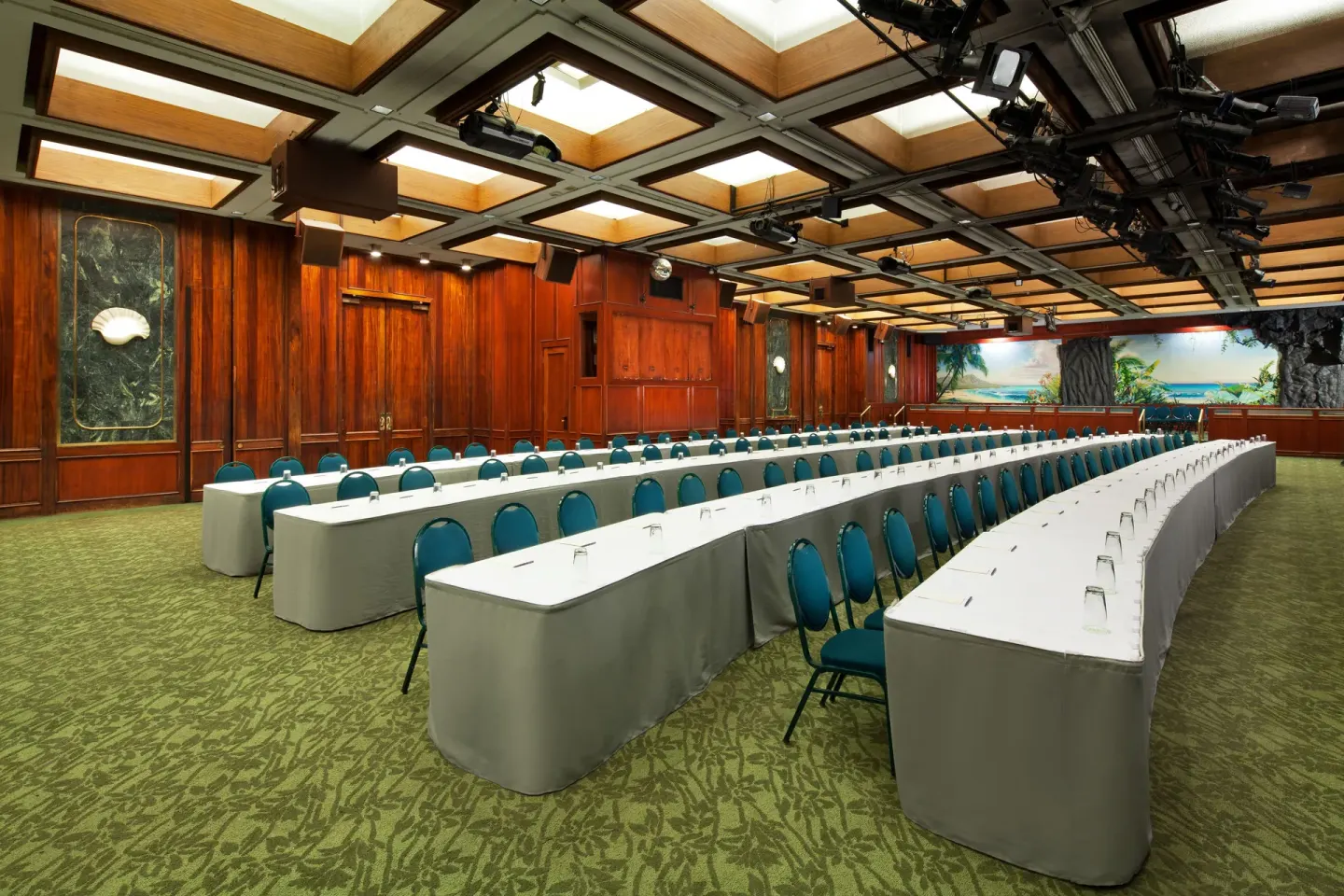 A large meeting room with long classroom tables is set at Sheraton Princess Kaiulani.