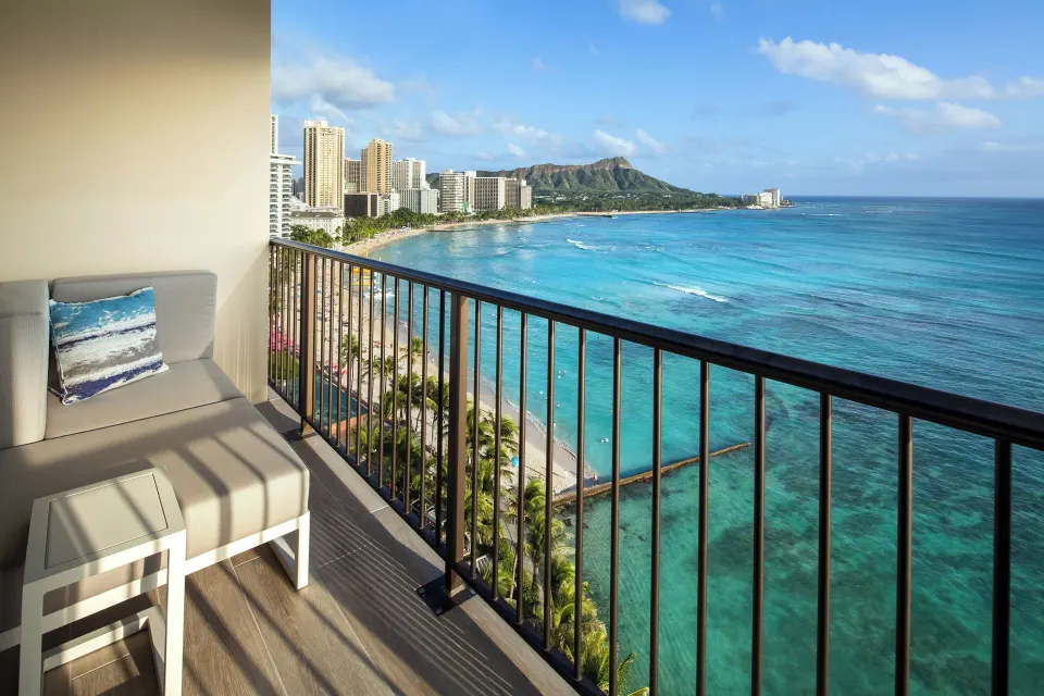 Kai Suite balcony with Waikiki oceanfront view at Sheraton Waikiki Beach Resort.