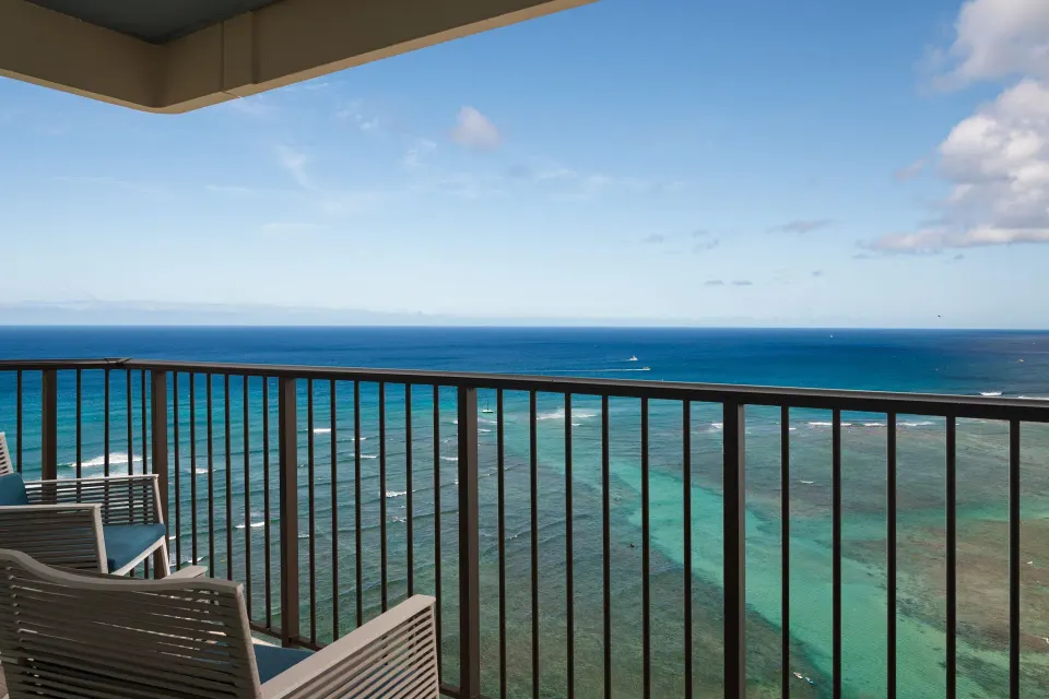 Oceanfront balcony view from the Ohana Suite at Sheraton Waikiki Beach Resort.