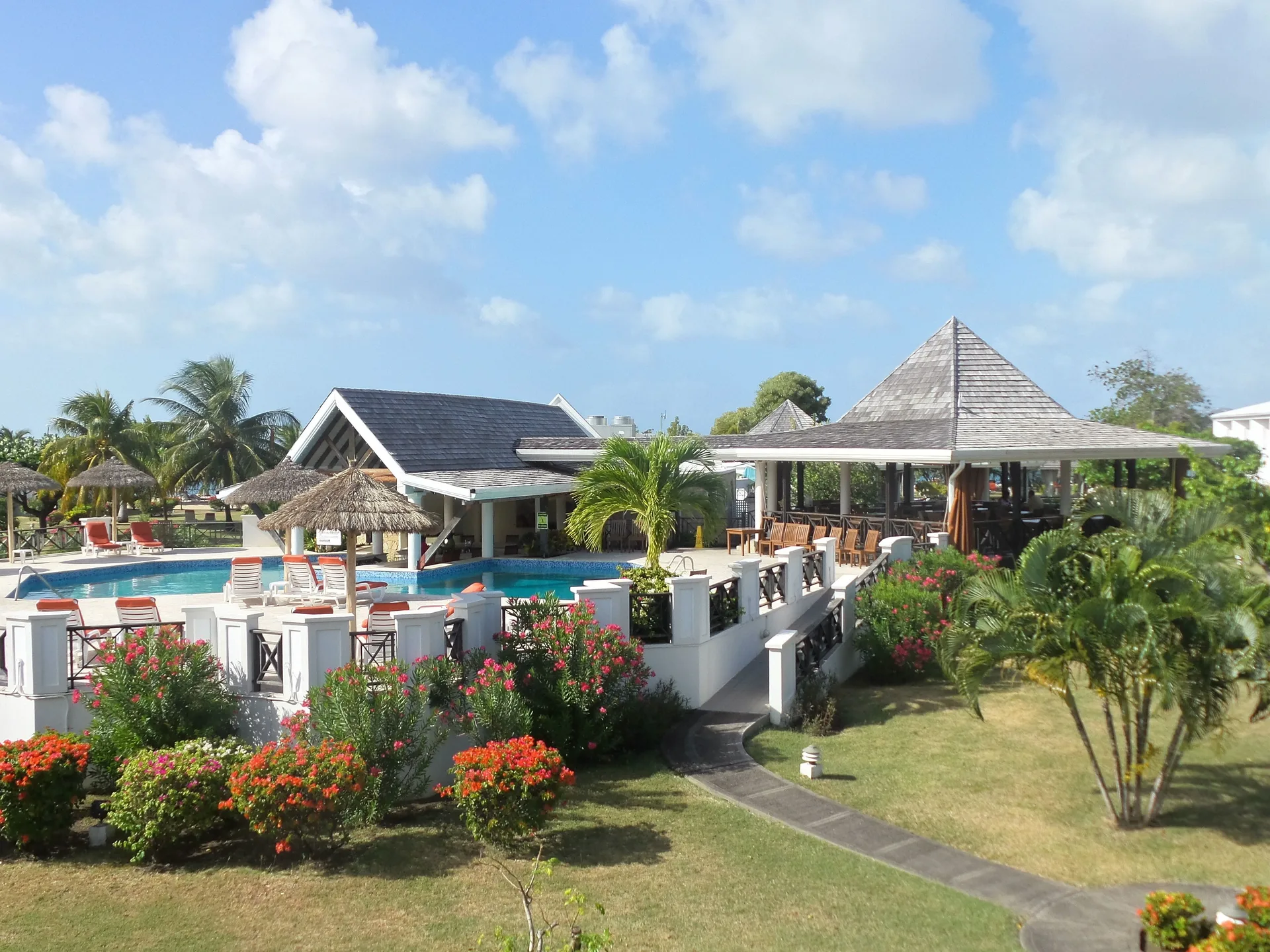 Coyaba Beach Resort Grenada beachfront hotel with tropical gardens and relaxed Grand Anse setting