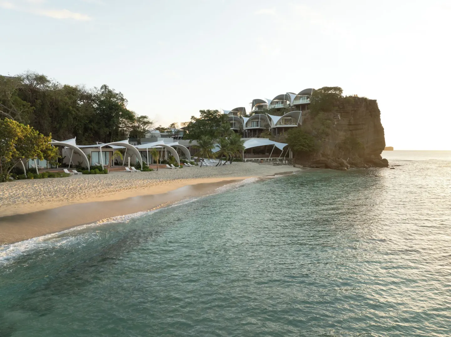 Beachfront resort buildings beside the sea at Silversands Beach House Grenada.