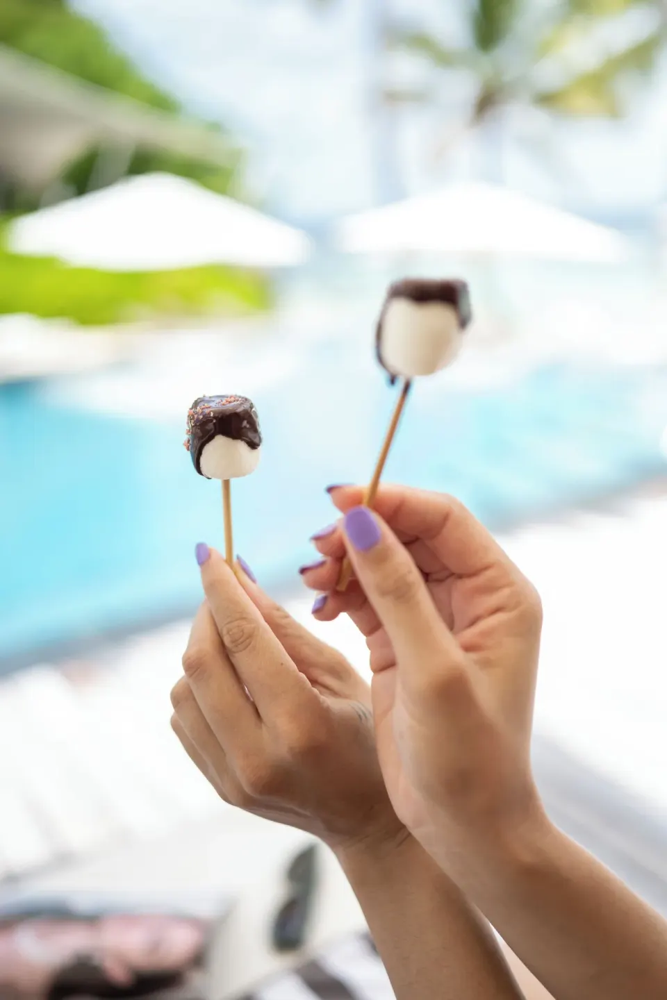 Chocolate-dipped treats are held beside the pool at Silversands Beach House Grenada.