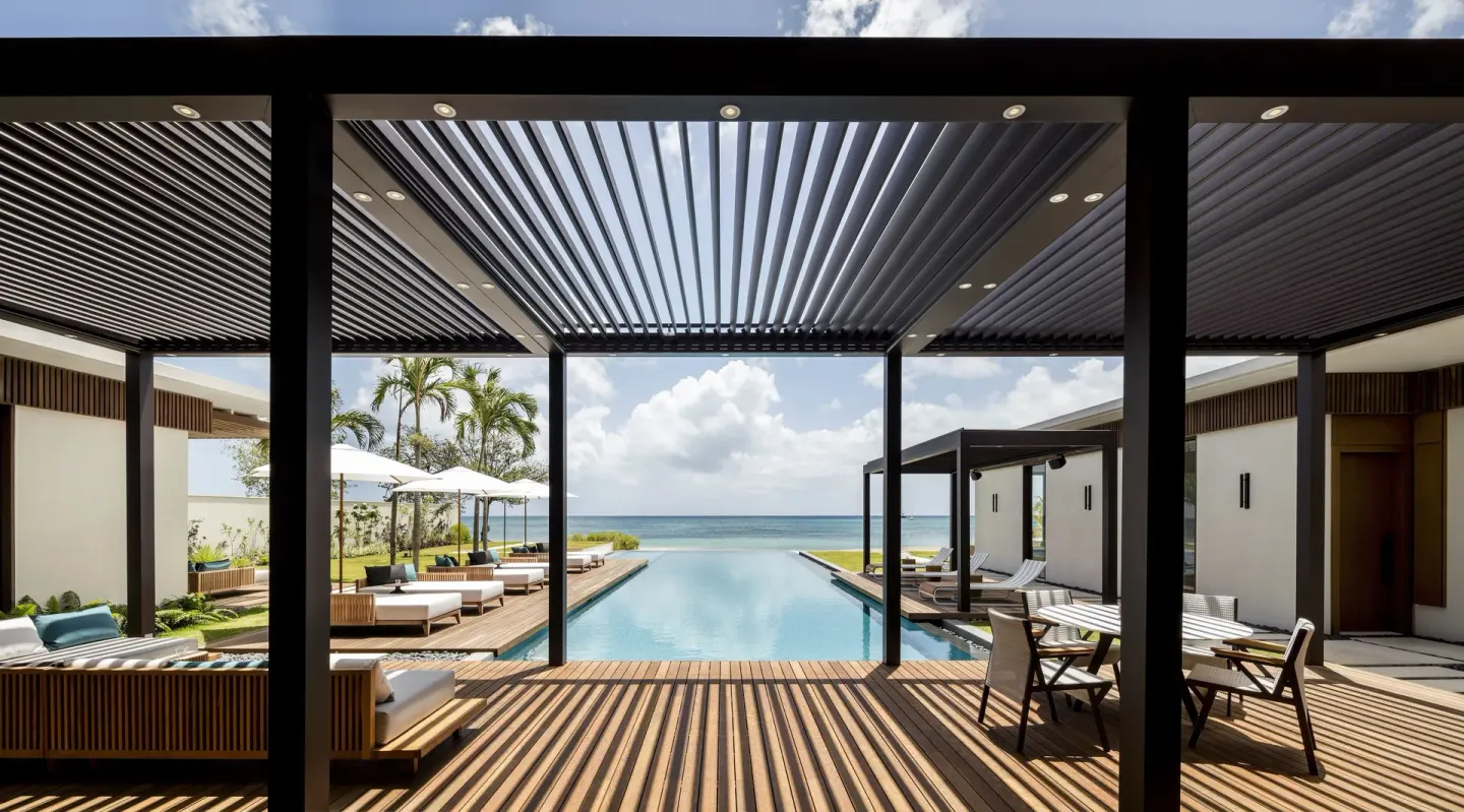 Beachfront villa terrace, pool and ocean at Silversands Beach House Grenada.