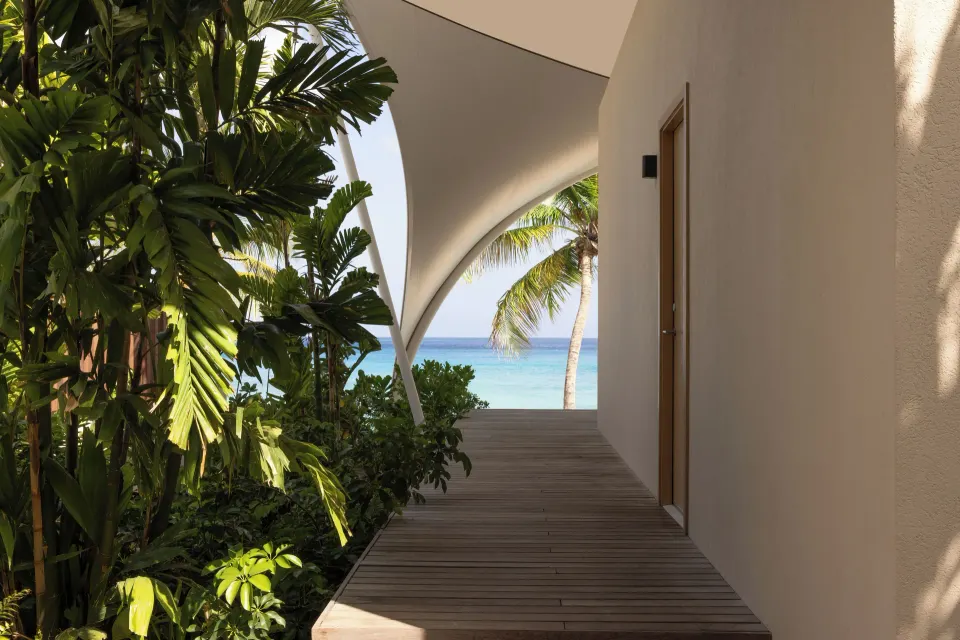 Beachfront Bungalow walkway to the sea at Silversands Beach House Grenada.