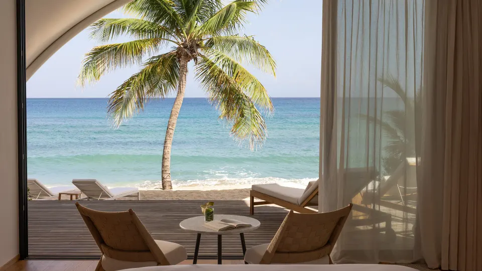 Inside the Beachfront Junior Suite at Silversands Beach House Grenada — from the hotel's own gallery.