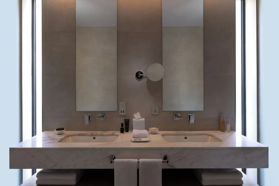 Double vanity bathroom in an Island View room at Silversands Beach House Grenada.