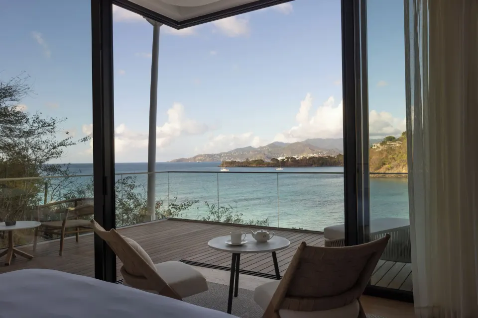 Island View room terrace overlooking the sea at Silversands Beach House Grenada.