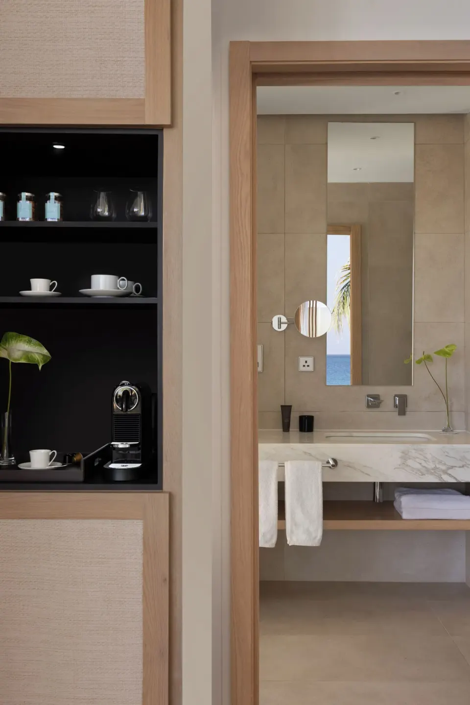 In-room coffee bar and bathroom vanity in an Ocean View room at Silversands Beach House Grenada.
