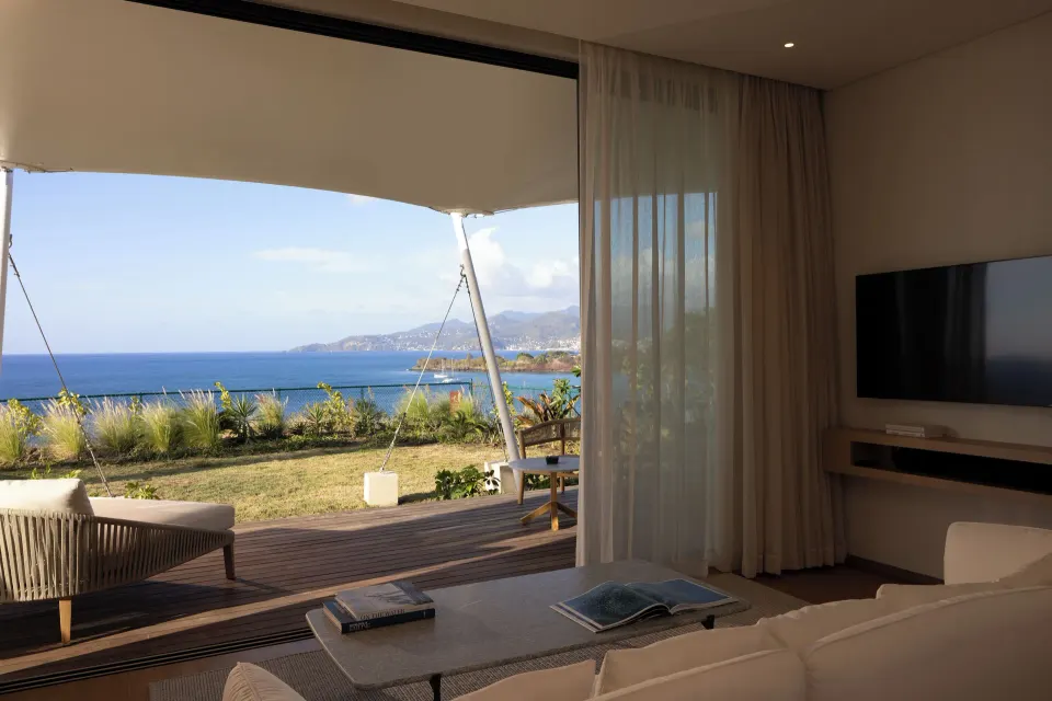 Living room terrace with ocean view at Silversands Beach House Grenada.