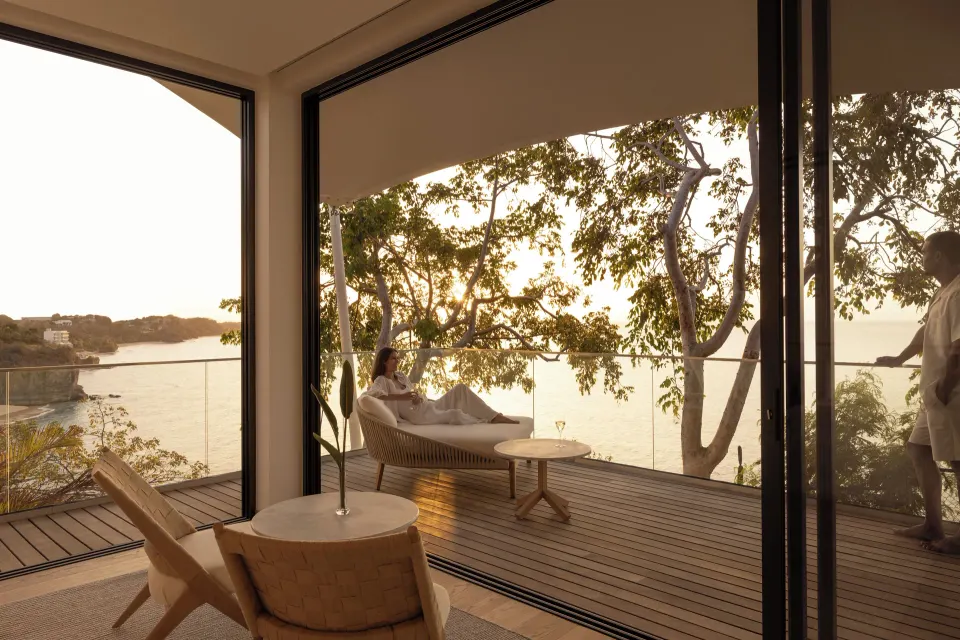Sunset terrace with lounge seating at Silversands Beach House Grenada.