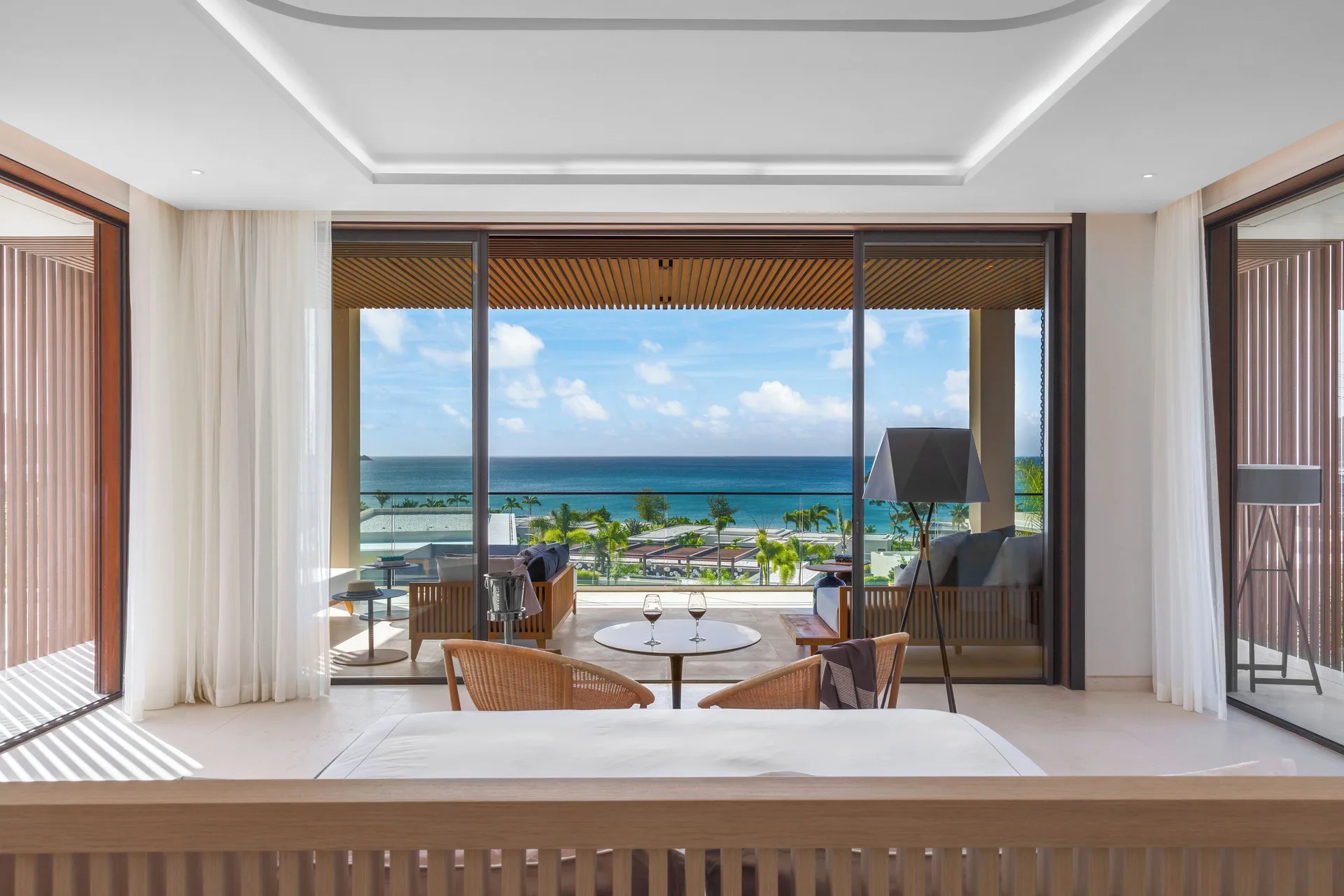 King bedroom facing an oceanview terrace at Silversands Beach House Grenada.