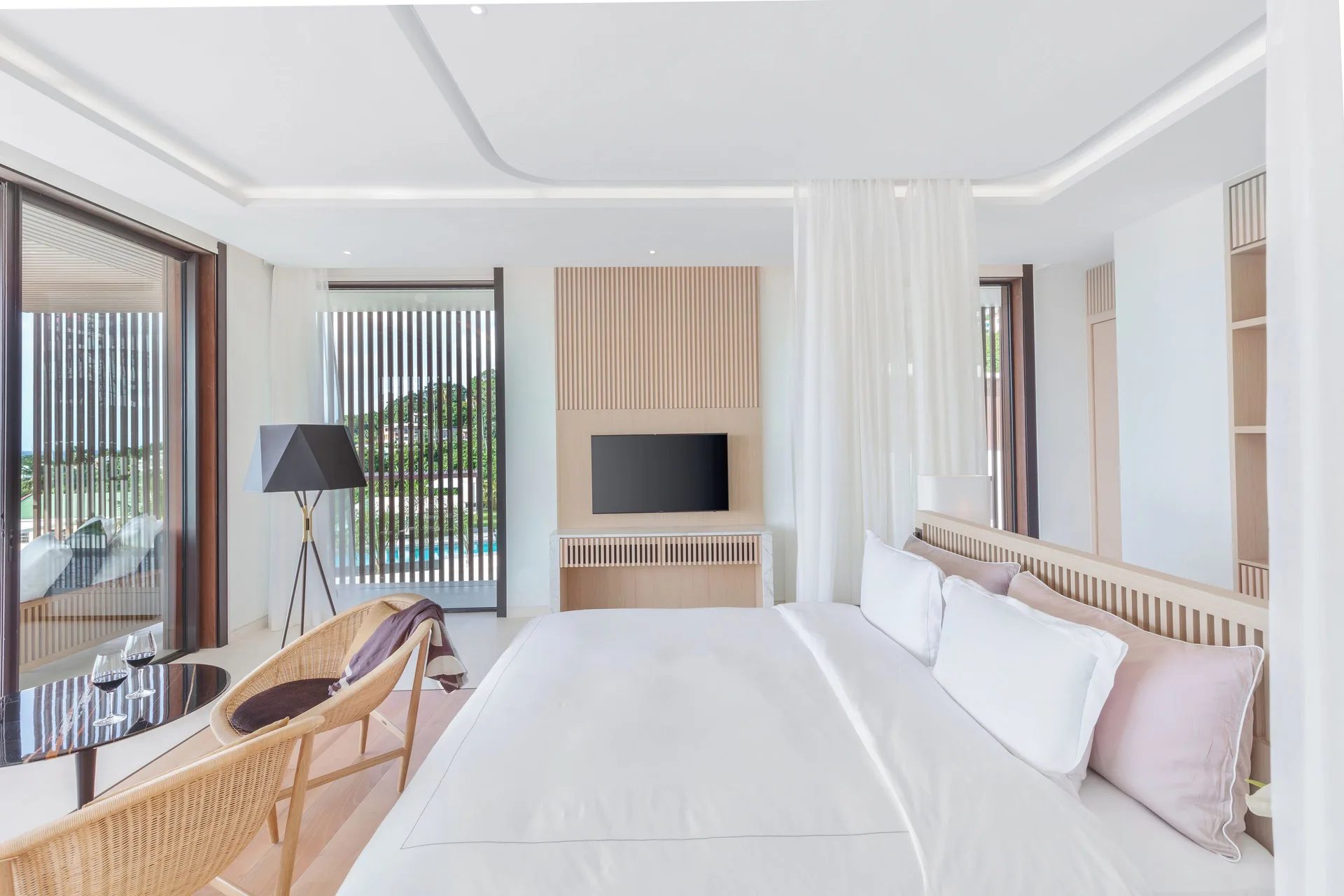 Bright oceanview villa bedroom with king bed at Silversands Beach House Grenada.