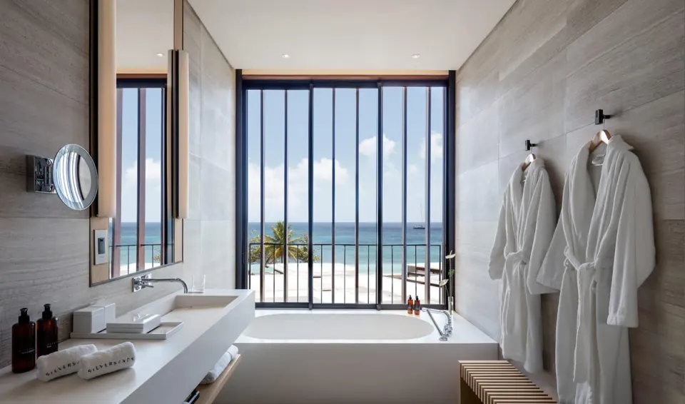 Ocean-view bathroom in the Two Bedroom Panoramic Ocean View Suite at Silversands Beach House Grenada.