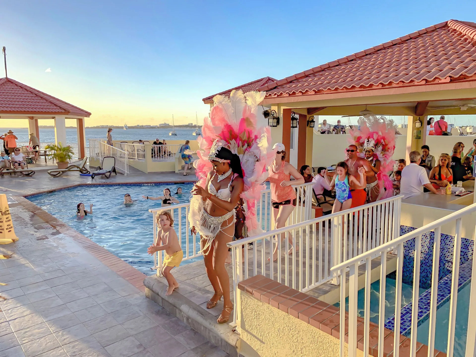 Poolside celebration with feathered performers at Simpson Bay Resort, Marina & Spa.