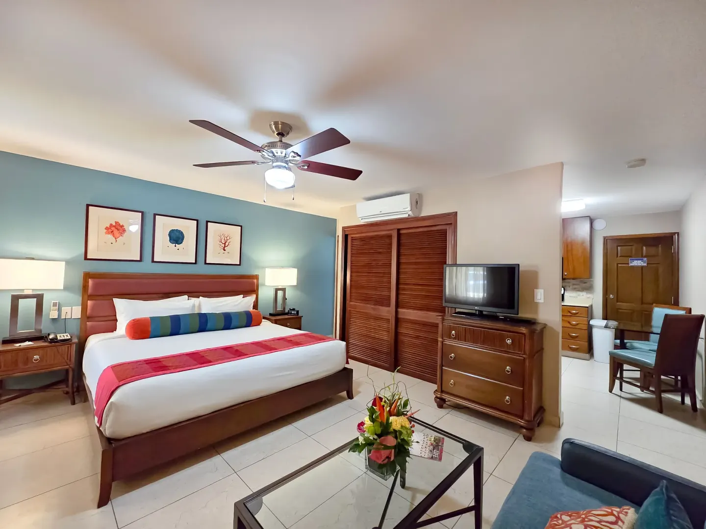 Deluxe studio with king bed, TV and kitchen entry at Simpson Bay Resort, Marina & Spa.