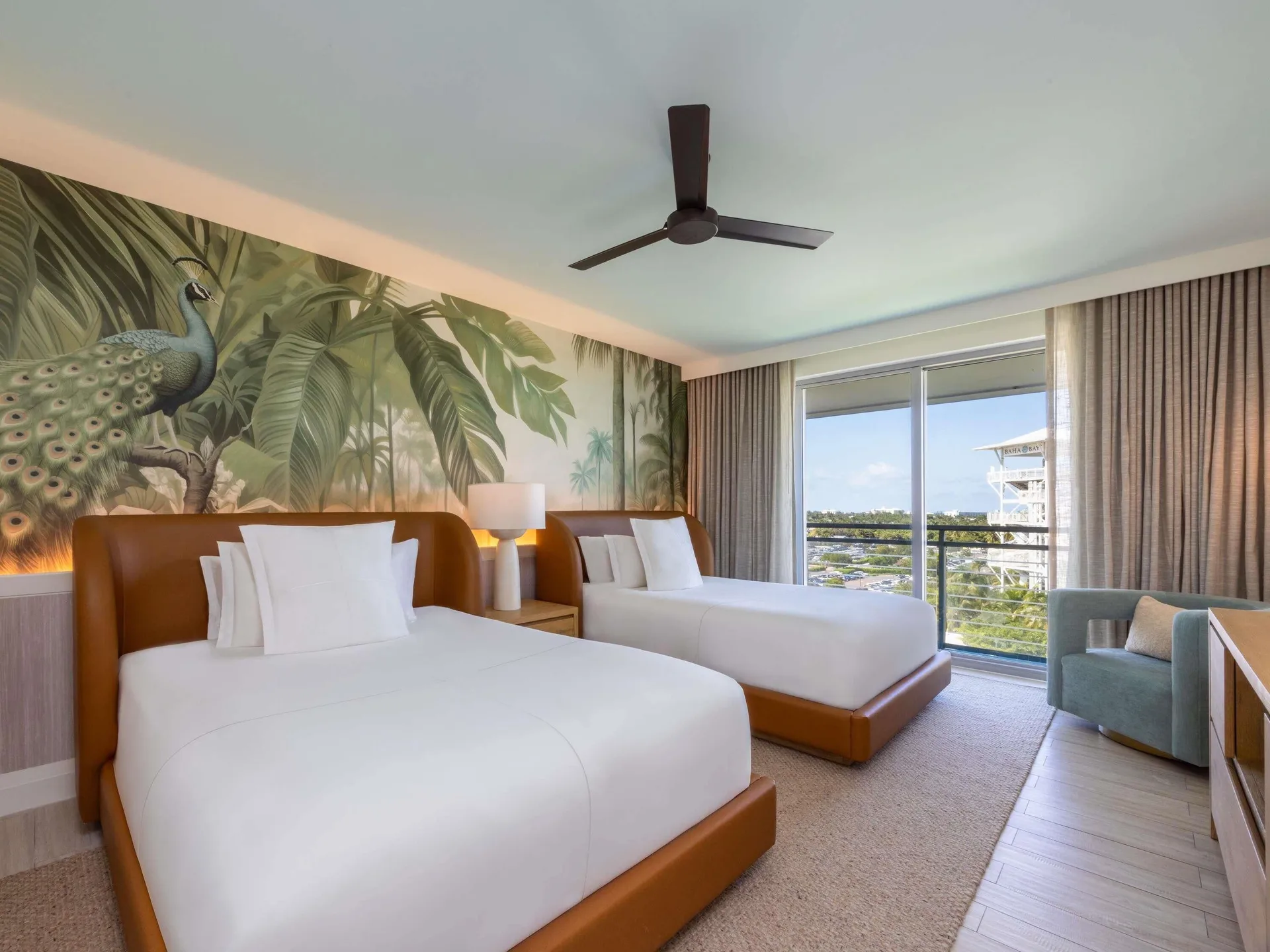 Ocean View Queens guest room with two beds and balcony at SLS Baha Mar.