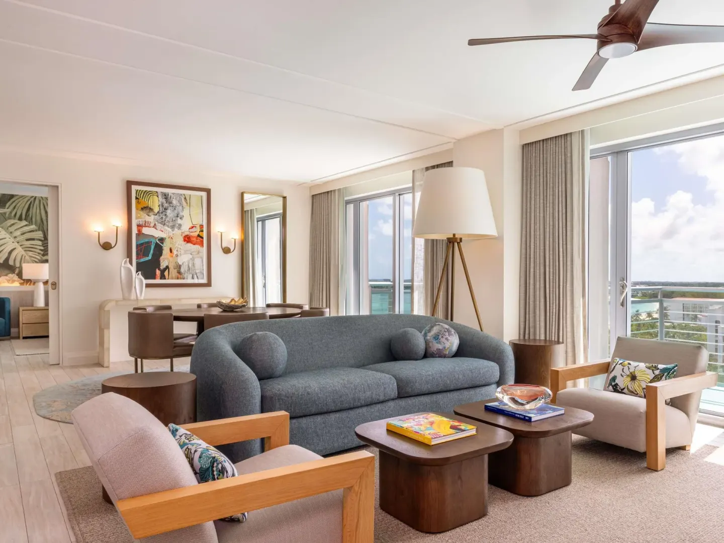 Ocean View Two Bedroom Residence living room with balcony at SLS Baha Mar.