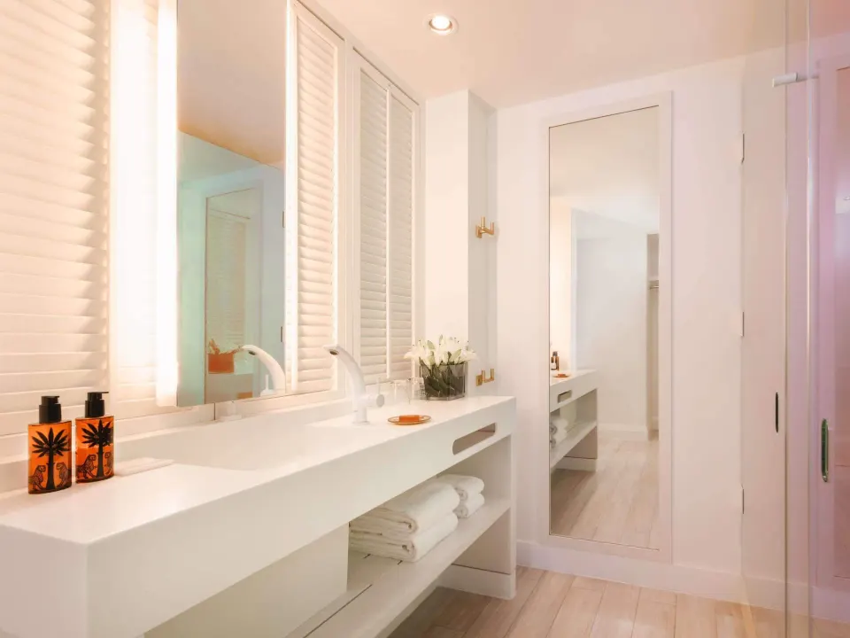 Superior Suite bathroom vanity with double sinks and mirrors at SLS Baha Mar.