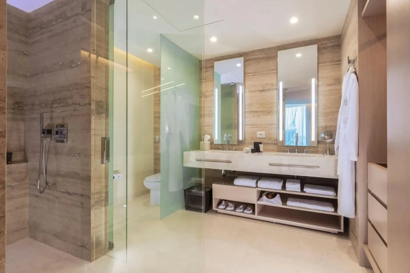 Superior Street View bathroom with glass shower and double vanity at SLS Cancun.