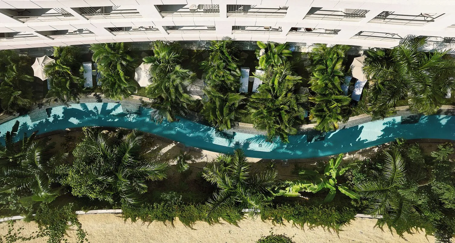 Overhead view of the Captivate Swim-Out pool corridor at SLS Playa Mujeres.