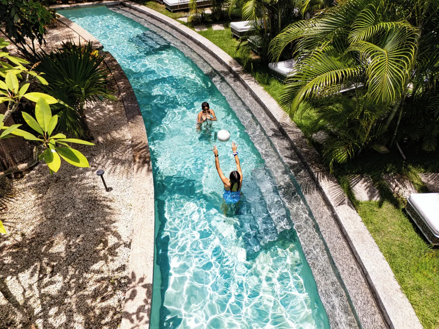Guests playing in the Captivate Swim-Out pool at SLS Playa Mujeres.