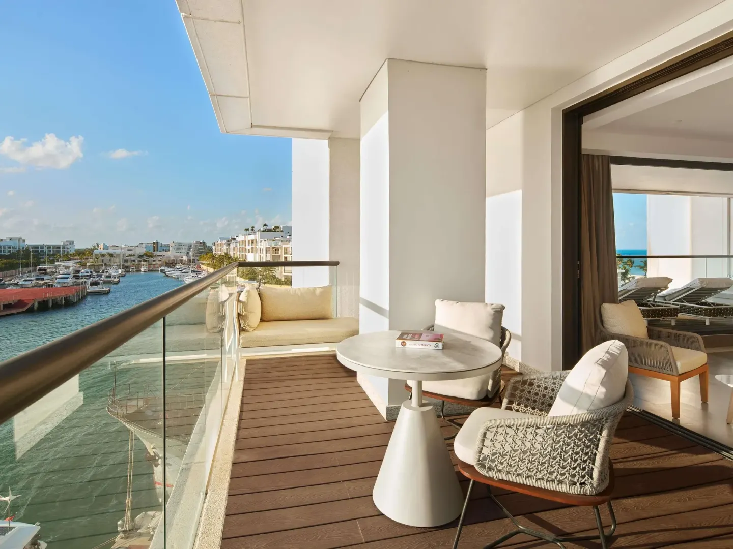 Euphoria Corner Suite Marina View balcony with marina and sea views at SLS Playa Mujeres.