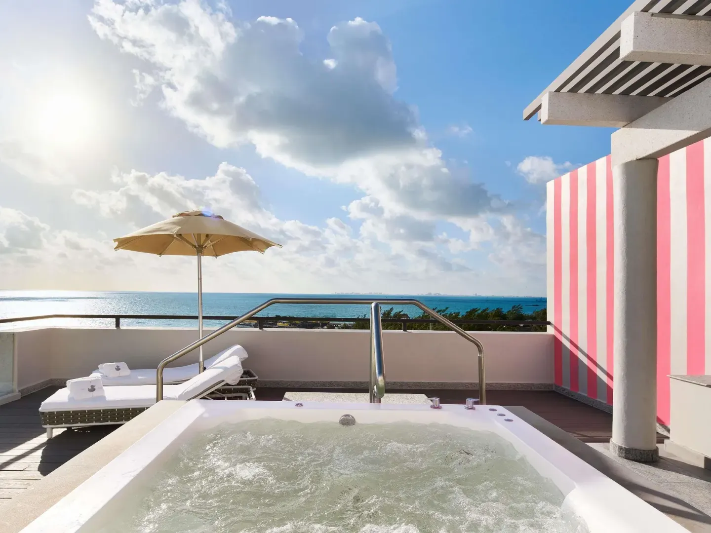 Rooftop hot tub and ocean-view terrace in an SLS Playa Mujeres at SLS Playa Mujeres.