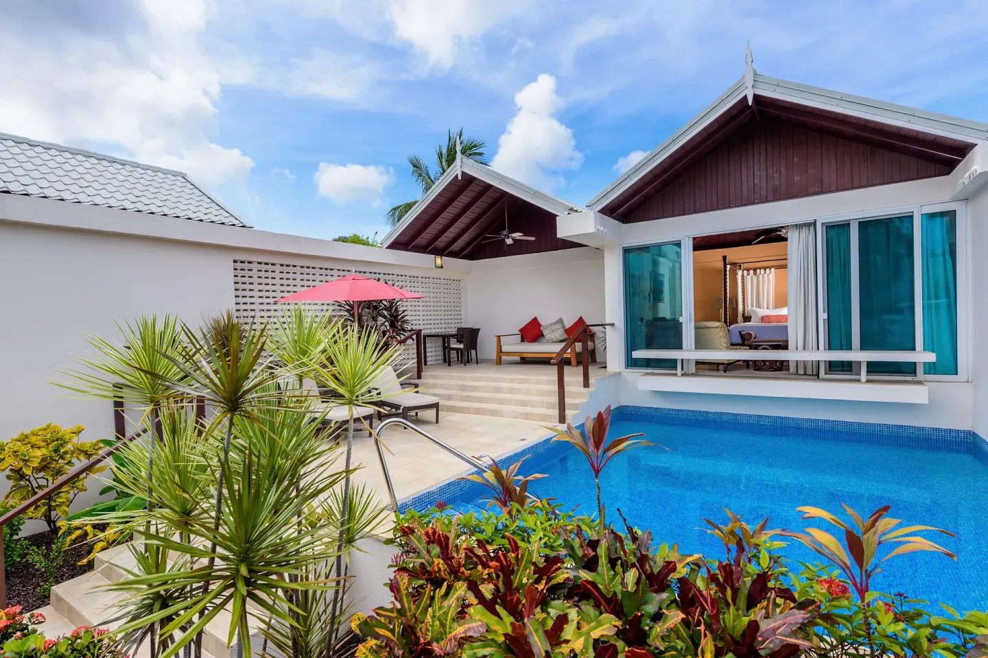 Luxury Almond Pool Suite exterior with private pool at Spice Island Beach Resort.