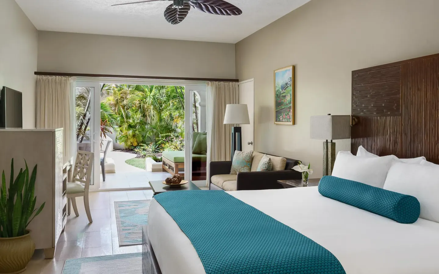 Inside the Oleander Garden Suite at Spice Island Beach Resort — from the hotel's own gallery.