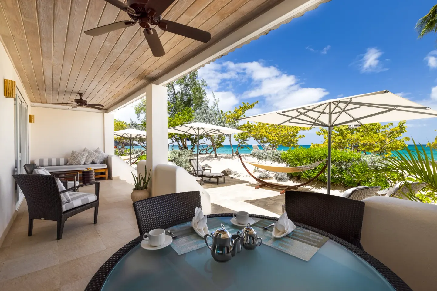 Inside the Royal Cinnamon and Saffron Beach Suites at Spice Island Beach Resort — from the hotel's own gallery.