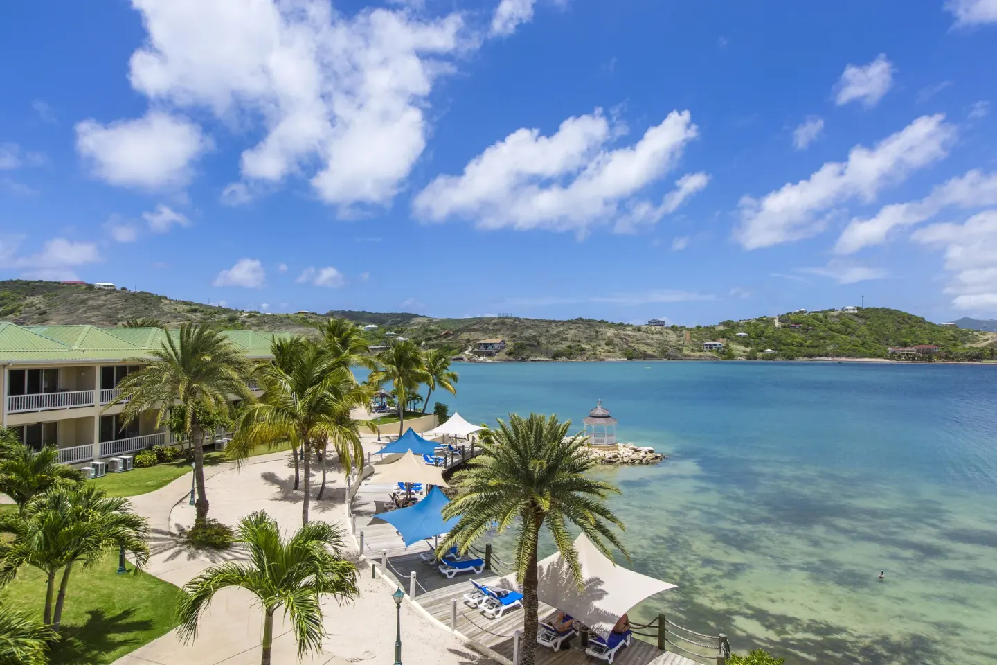 Bayfront resort grounds and loungers at St. James's Club Antigua.