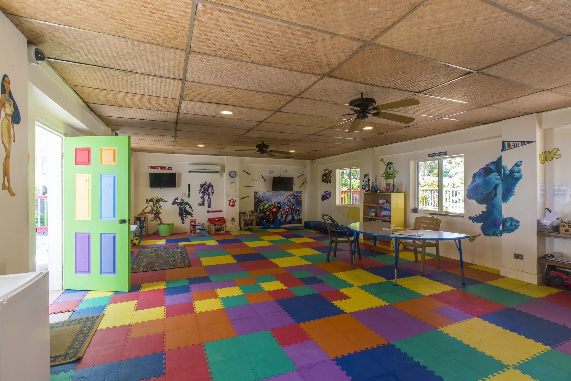 Colorful indoor kids' club playroom at St. James's Club Antigua.
