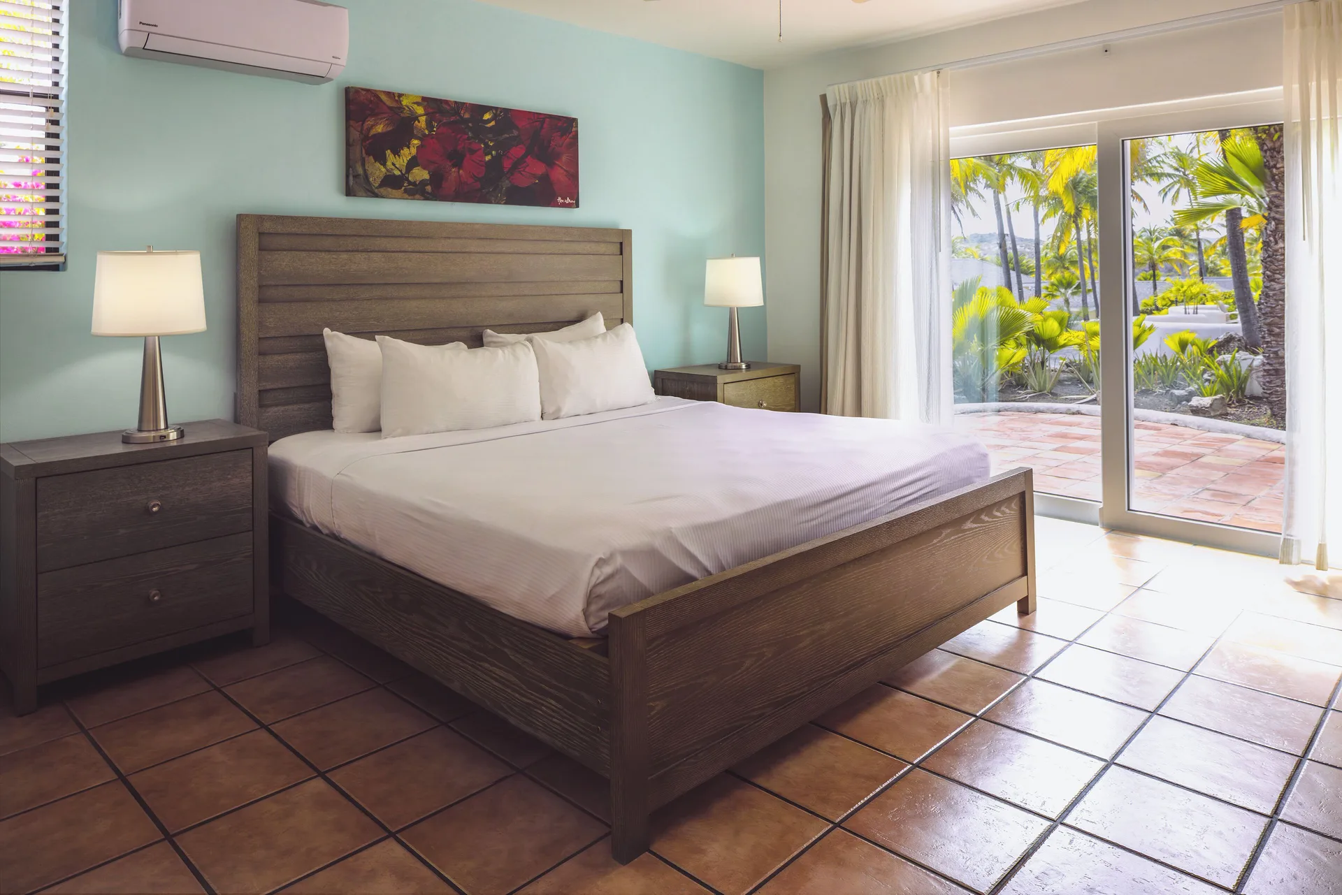 2 Bedroom Villa king bedroom with patio doors at St. James's Club Antigua.