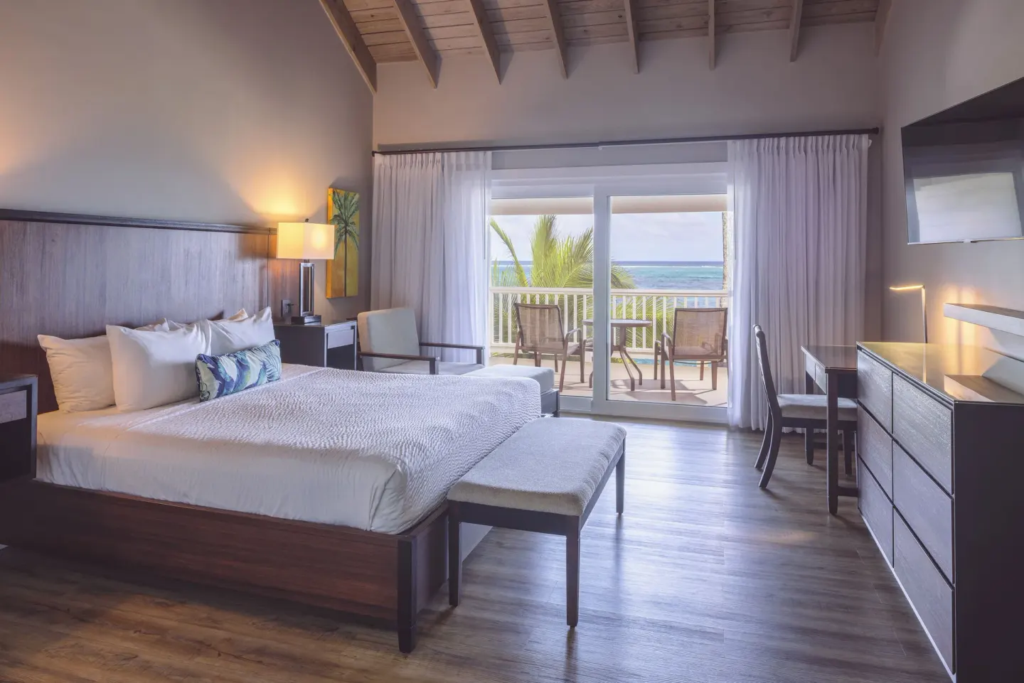 Beachfront Room with king bed and balcony ocean view at St. James's Club Antigua.