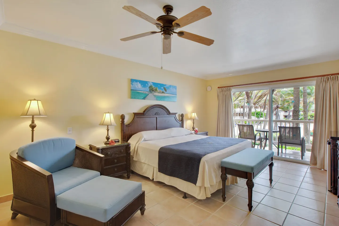 Club Room with king bed and balcony seating at St. James's Club Antigua.