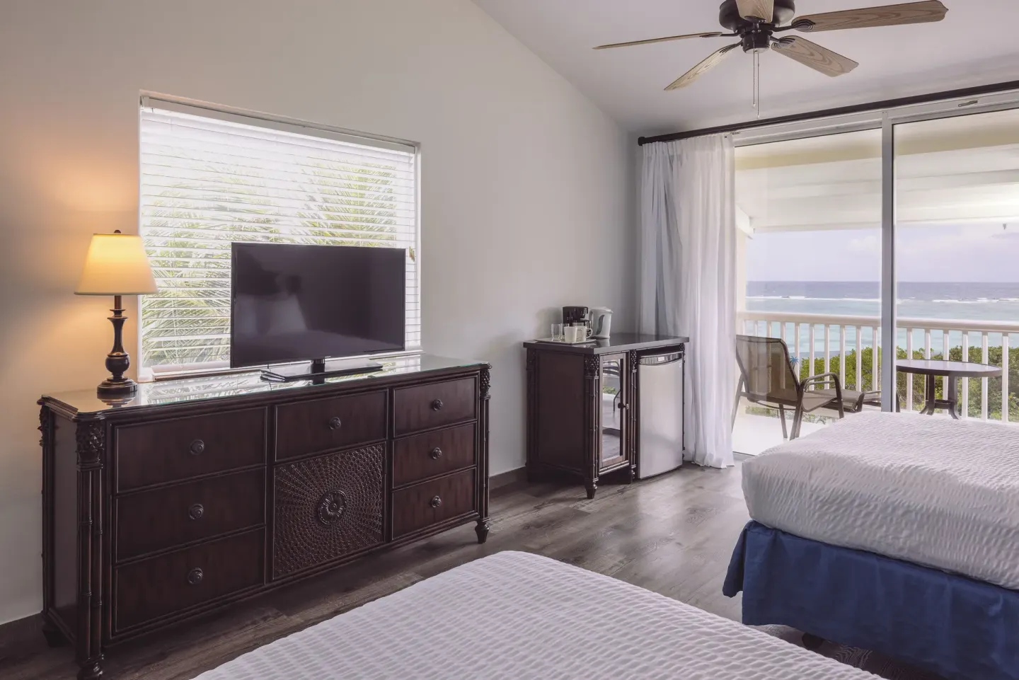 Premium Room with two beds and ocean-facing balcony at St. James's Club Antigua.