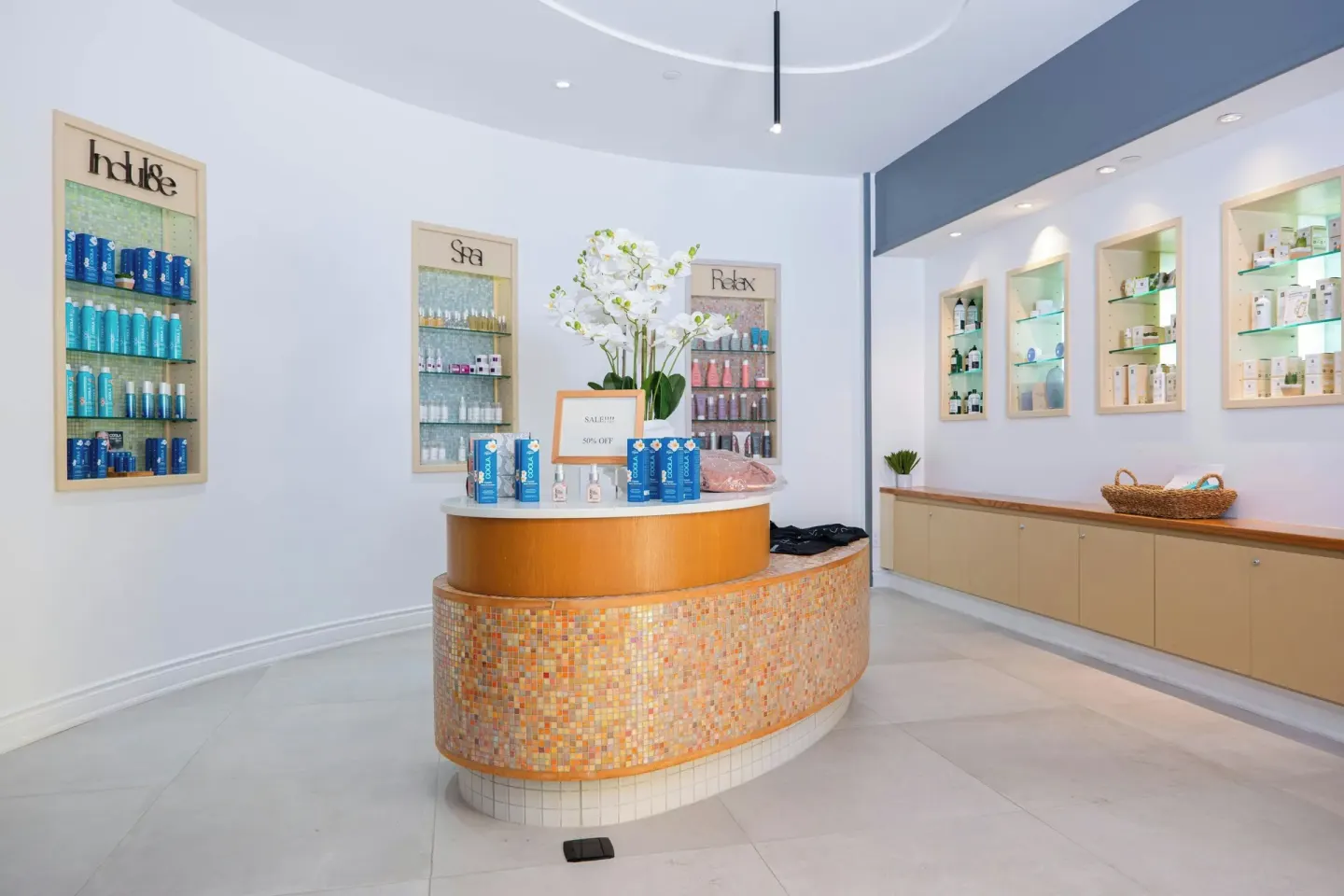 Spa retail reception with product shelves at St Kitts Marriott Beach Resort, Casino & Spa.