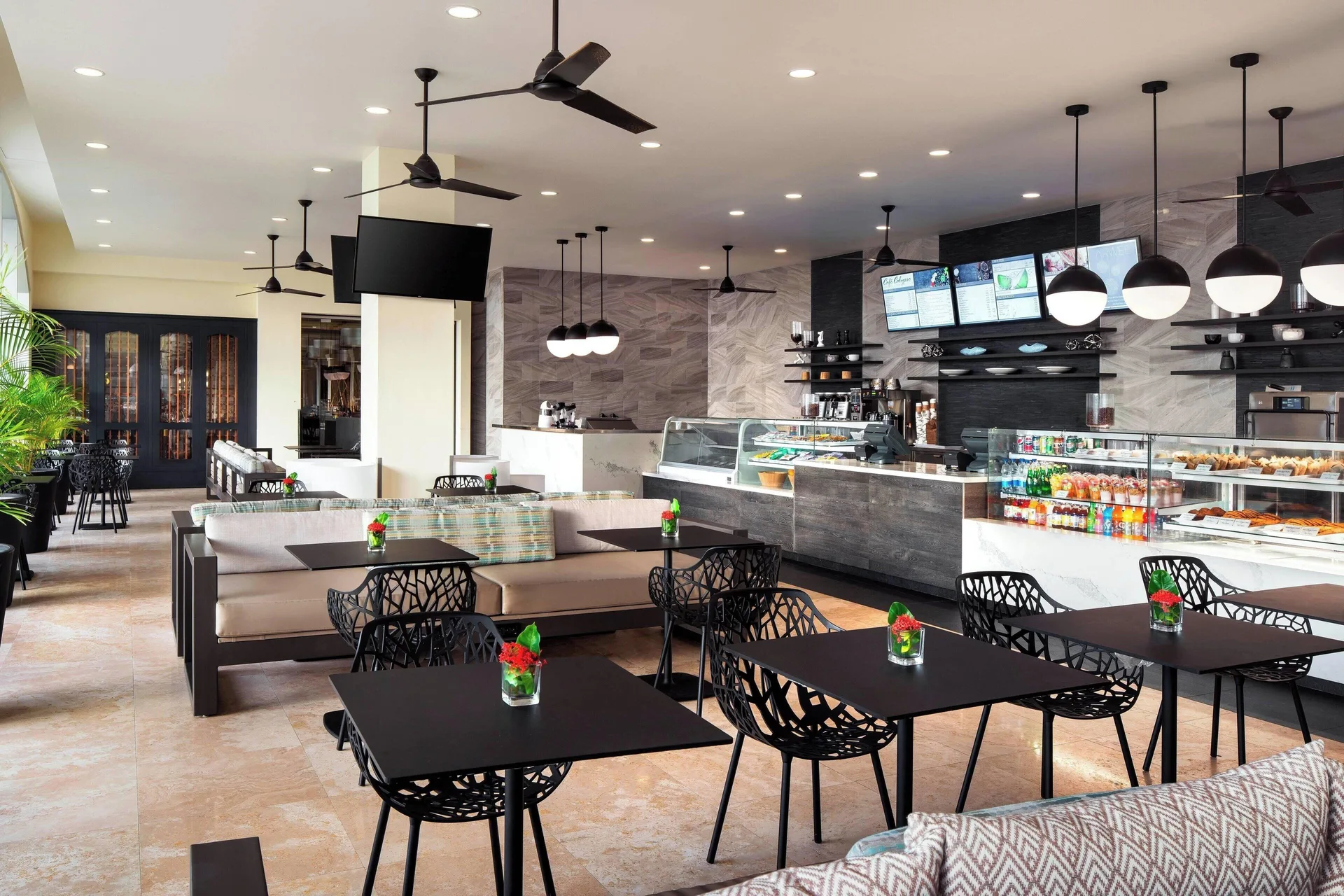 Casual café seating and display cases at St Kitts Marriott Beach Resort, Casino & Spa.