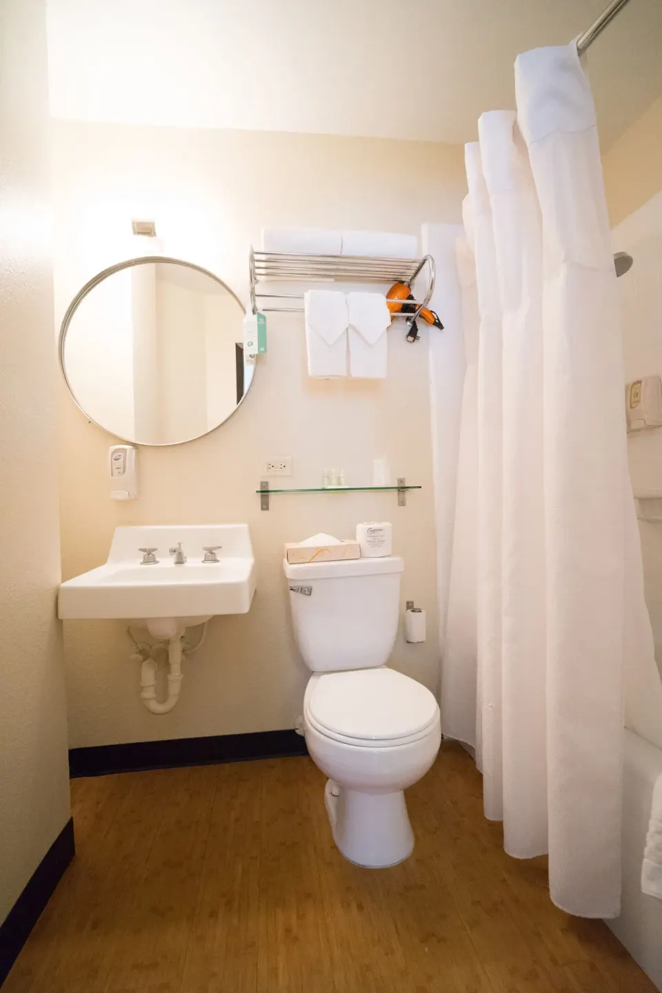 2 Twins Beds Room bathroom with sink, toilet, towels, and shower curtain at Stay Hotel Waikiki.