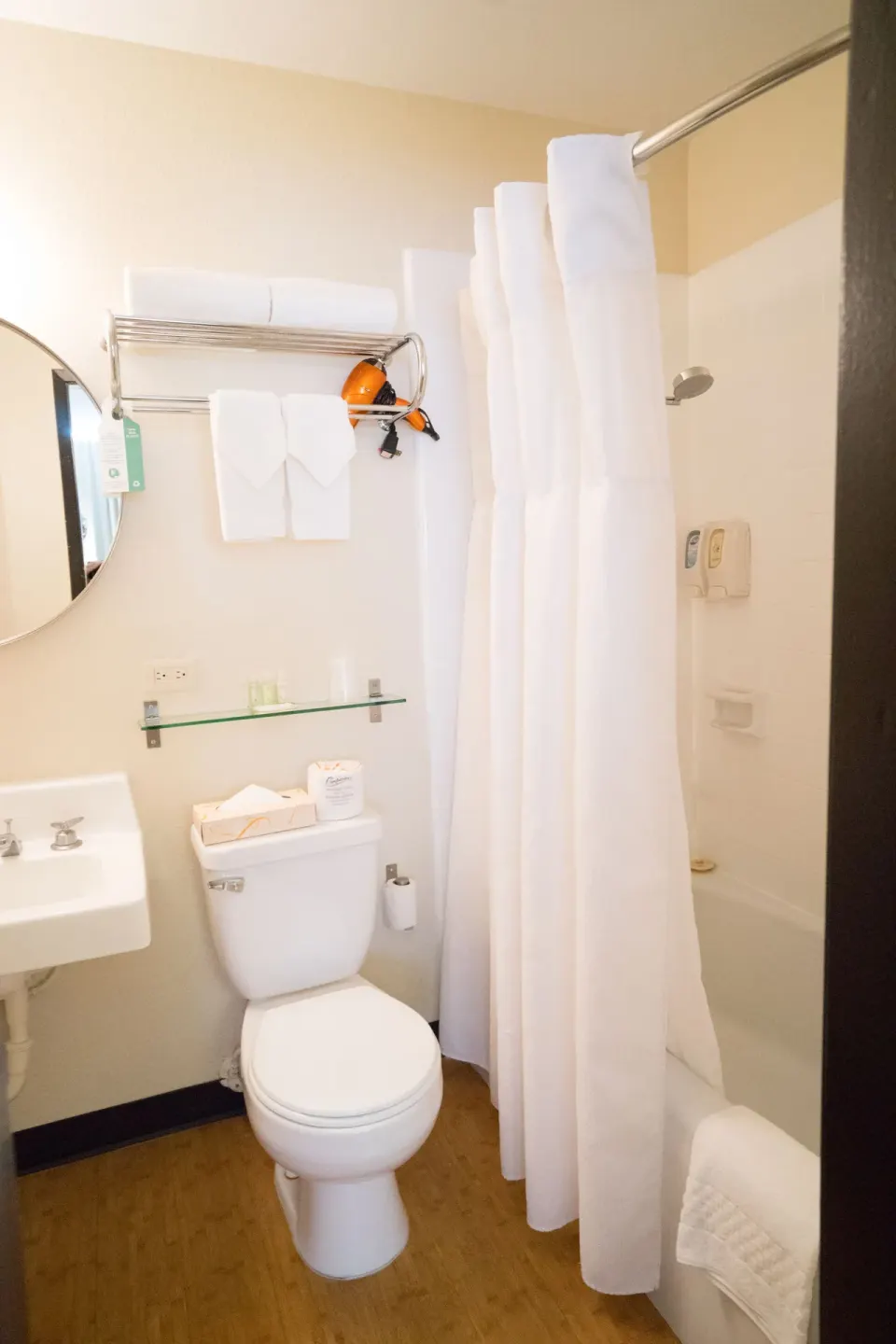 2 Twins Beds Room bathroom toilet, towel rack, and curtained tub shower at Stay Hotel Waikiki.