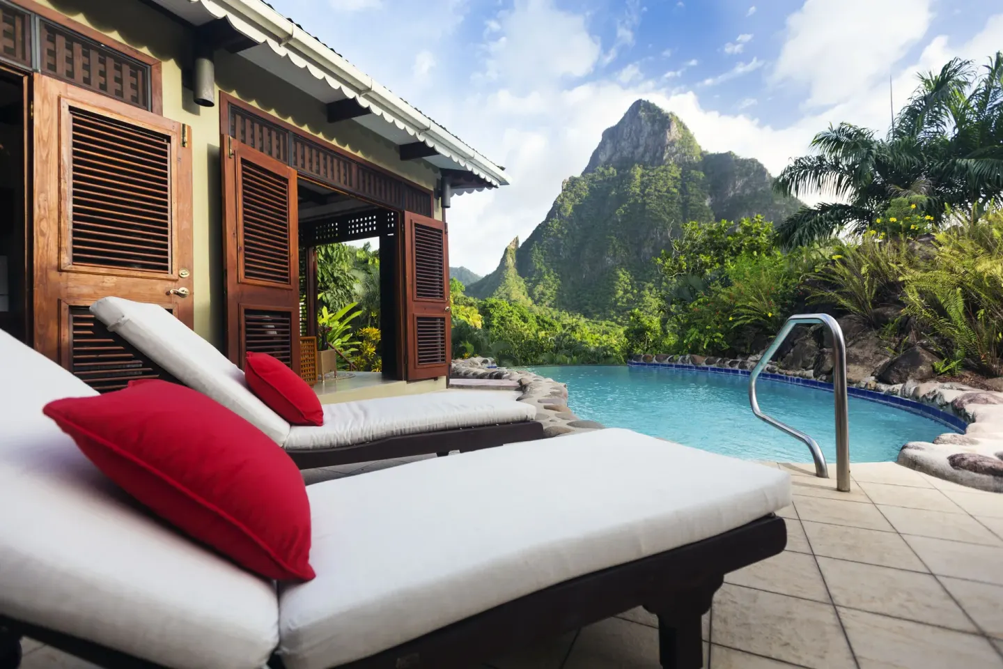 Private plunge pool with loungers and mountain view at Stonefield Villa Resort.